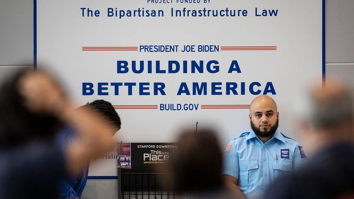 A security guard stands vigil at the Stamford Transportation Center on August 28, 2023 in Stamford, Connecticut.