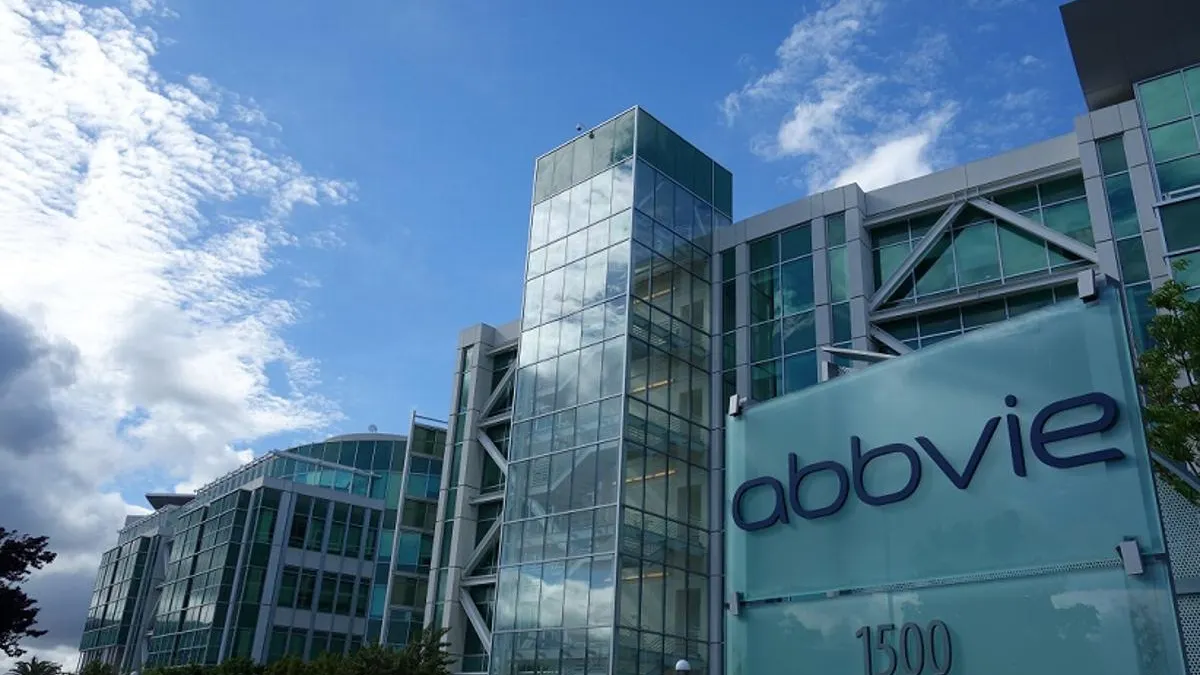 The outside of an AbbVie building, with the company's logo displayed.