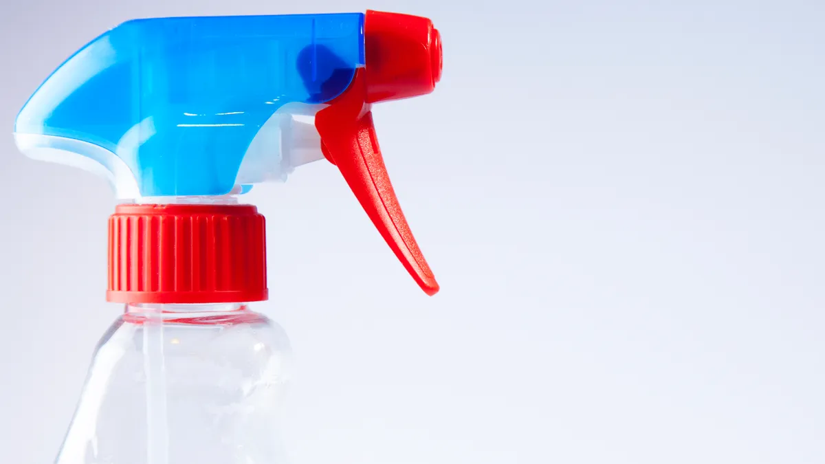 Blue and red spray bottle