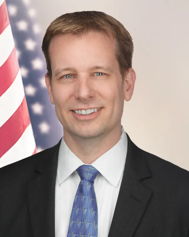 A headshot of Thomas Keane.