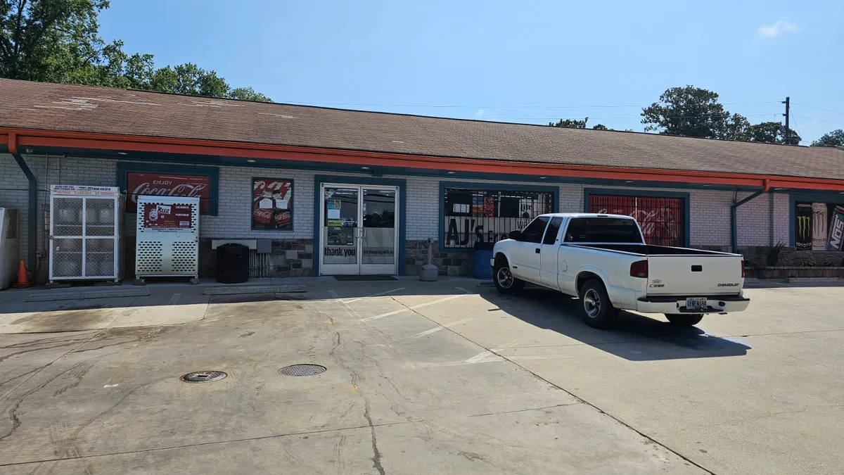 A photo of the exterior of AJ's Food Mart