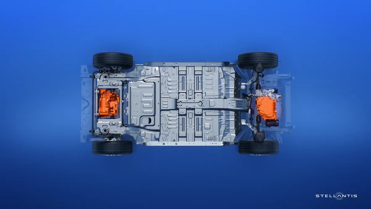 An overhead view of Stellantis' STLA Medium EV platform with the powertrain components highlighted in orange.