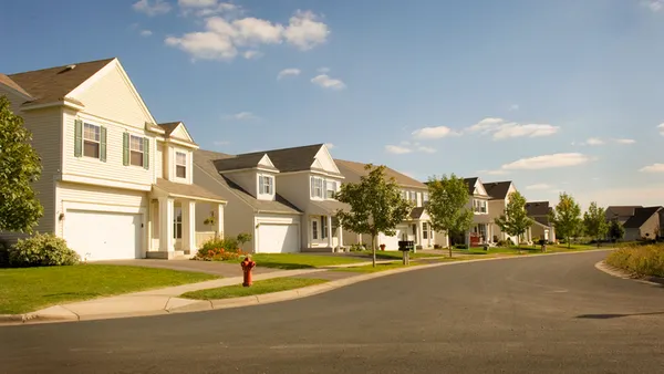a row of houses on a suburban lot