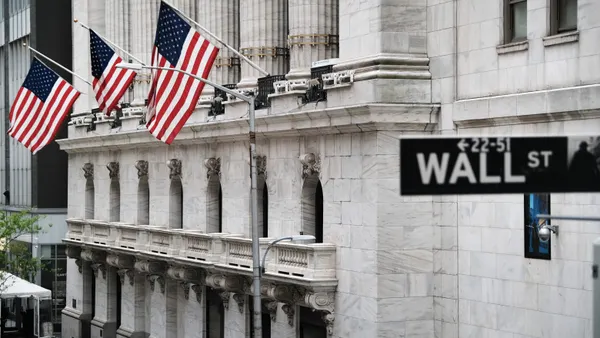 Flags fly outside the New York Stock Exchange building in New York City.