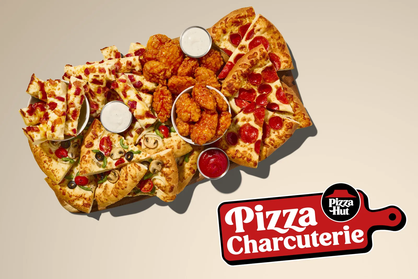 Pizza Hut&#x27;s version of a charceuterie board with pizza and wings.