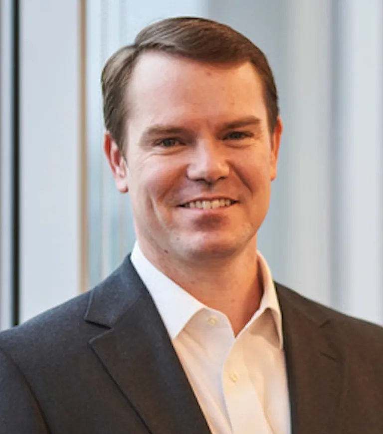 A headshot of Sundt Construction executive Sean Falvey.