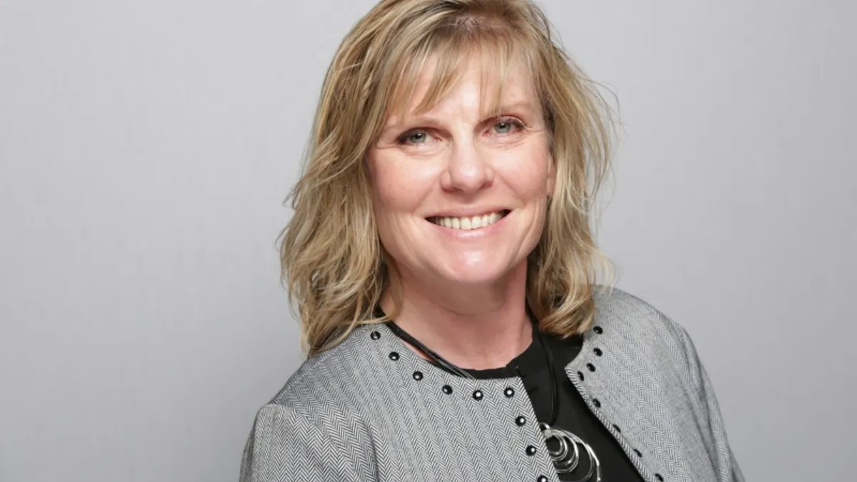 A headshot of Carrie Nelson, Amwell's new chief medical officer