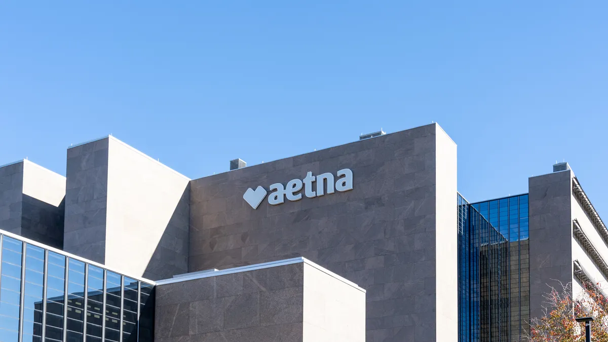 Aetna headquarters building with the Aetna logo on its facade.