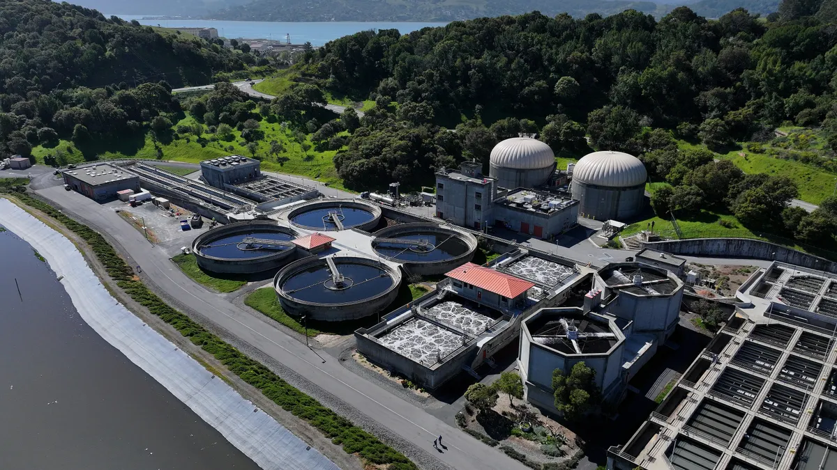 Pools of water are seen in an aerial photo of a wastewater treatment plant