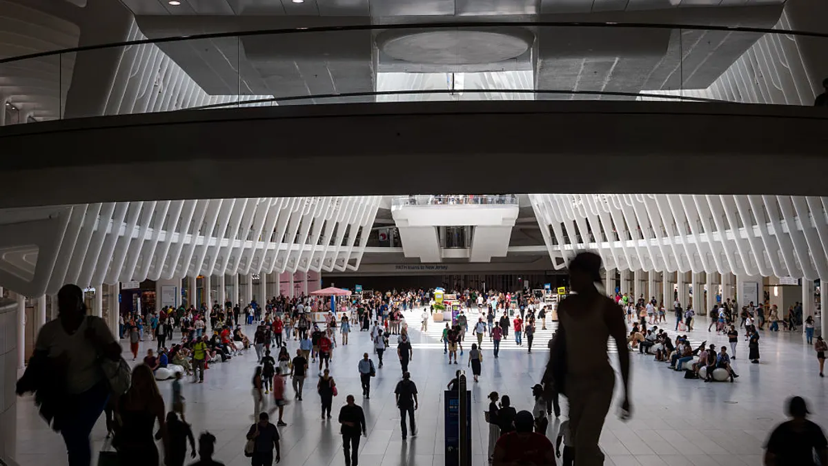 People walking at Oculus mall in New York City