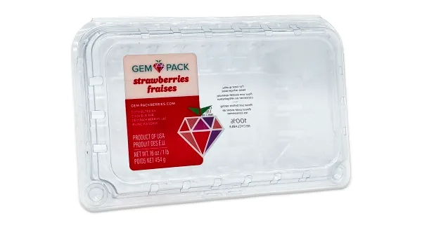 A clear plastic thermoform container for strawberries with Gem-Pack Berries' logo.