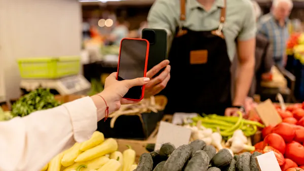 Apple iPhone payments mobile devices point of sale retail checkout cards