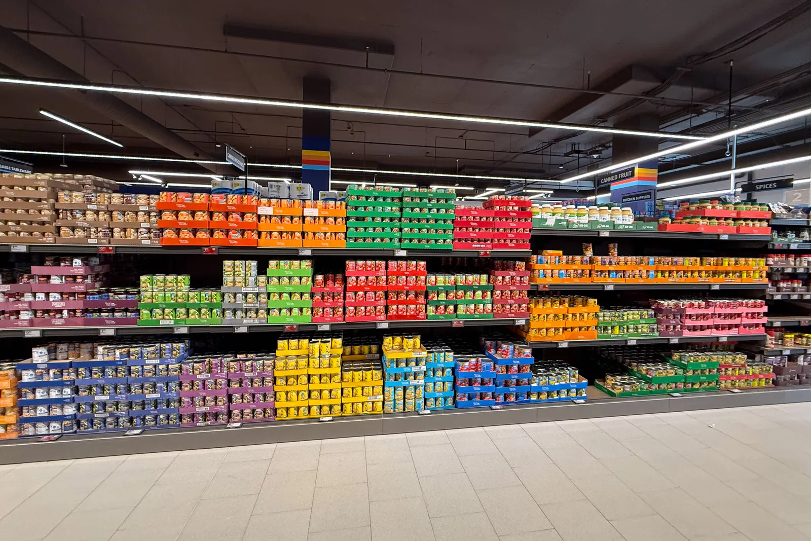 Canned fruits and vegetables in a grocery store.