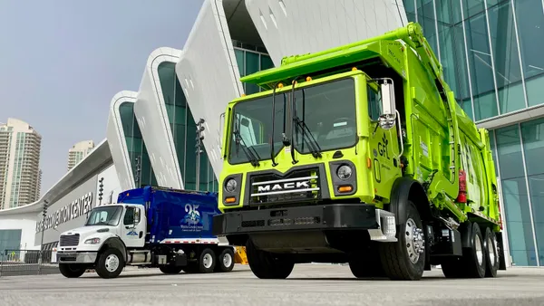 Waste Connections and GFL Environmental trucks outside of the Las Vegas Convention Center at WasteExpo 2022.