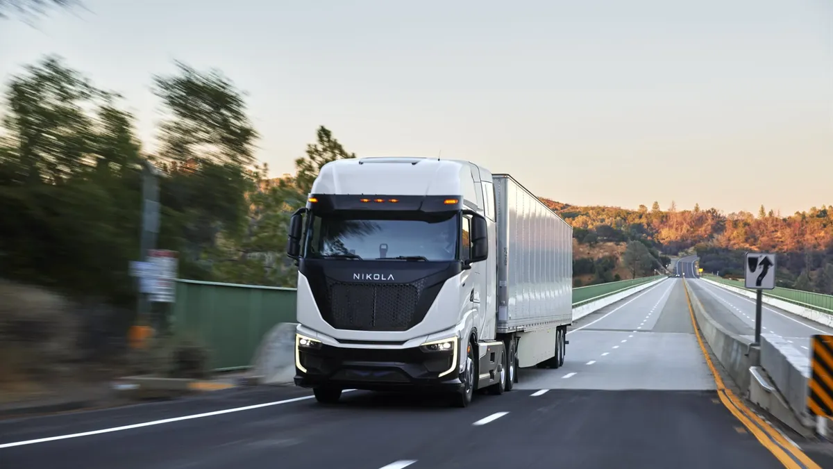 A Nikola hydrogen fuel cell electric vehicle on a highway.