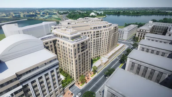 A computer rendering of a large building that overooks water.