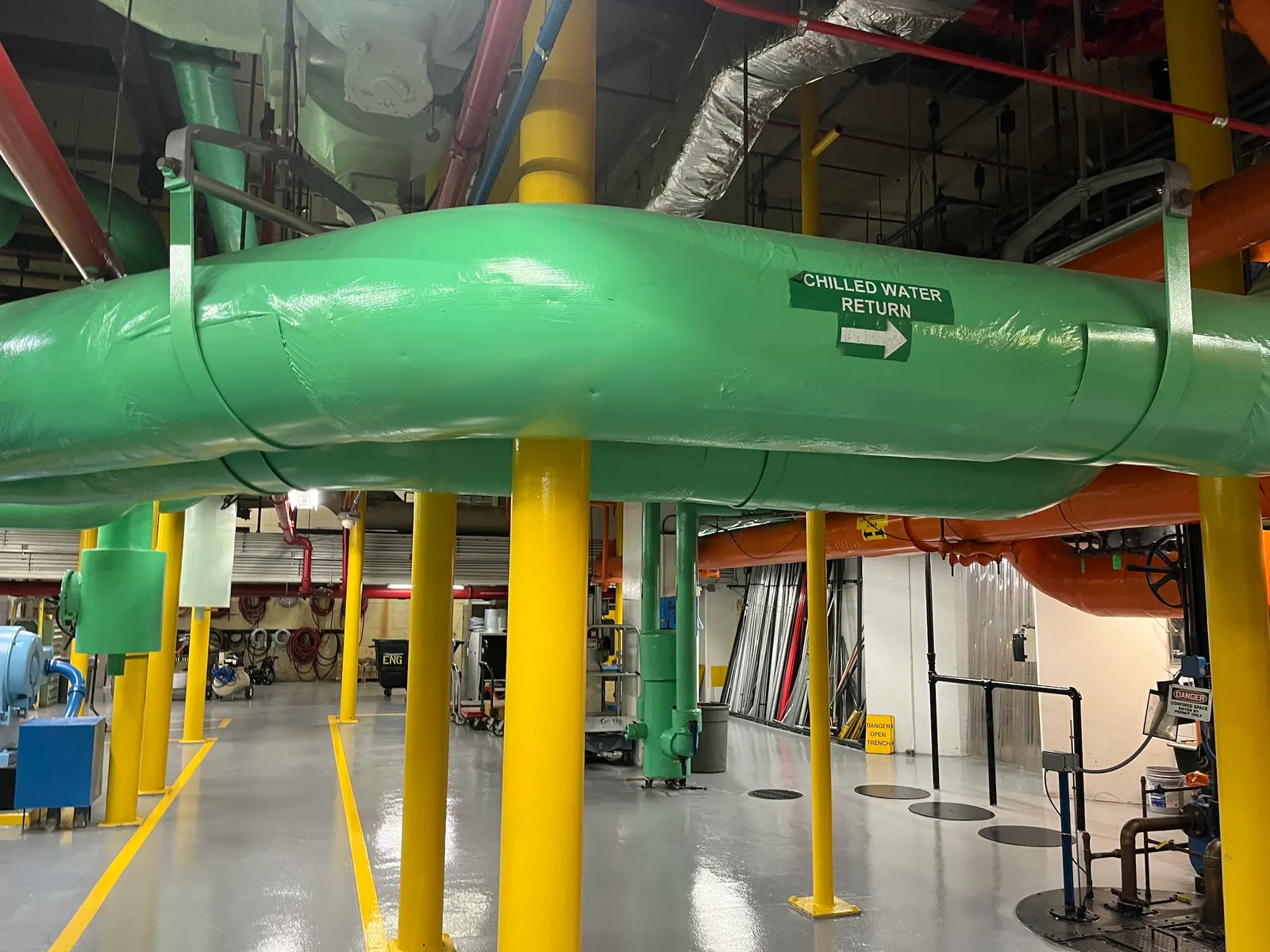 Chilled water return pipes run through the engineering department's space in the basement of the Aon Center.