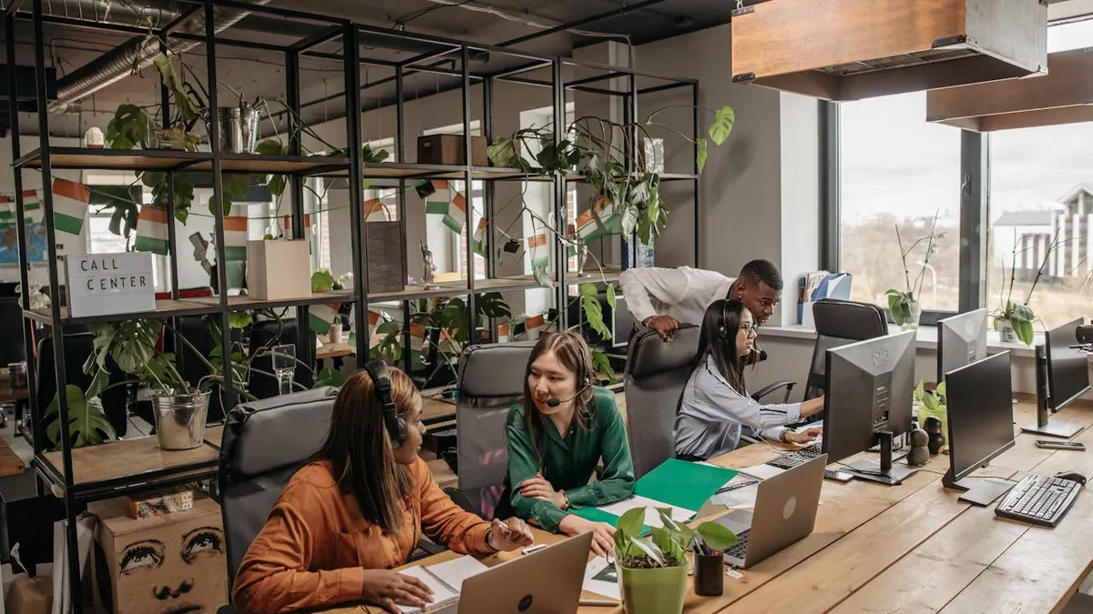 A team working in a call center office.