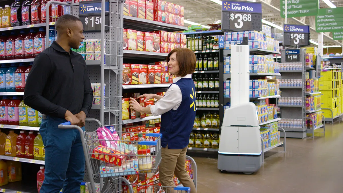 A shelf-scanning robot at a Walmart store