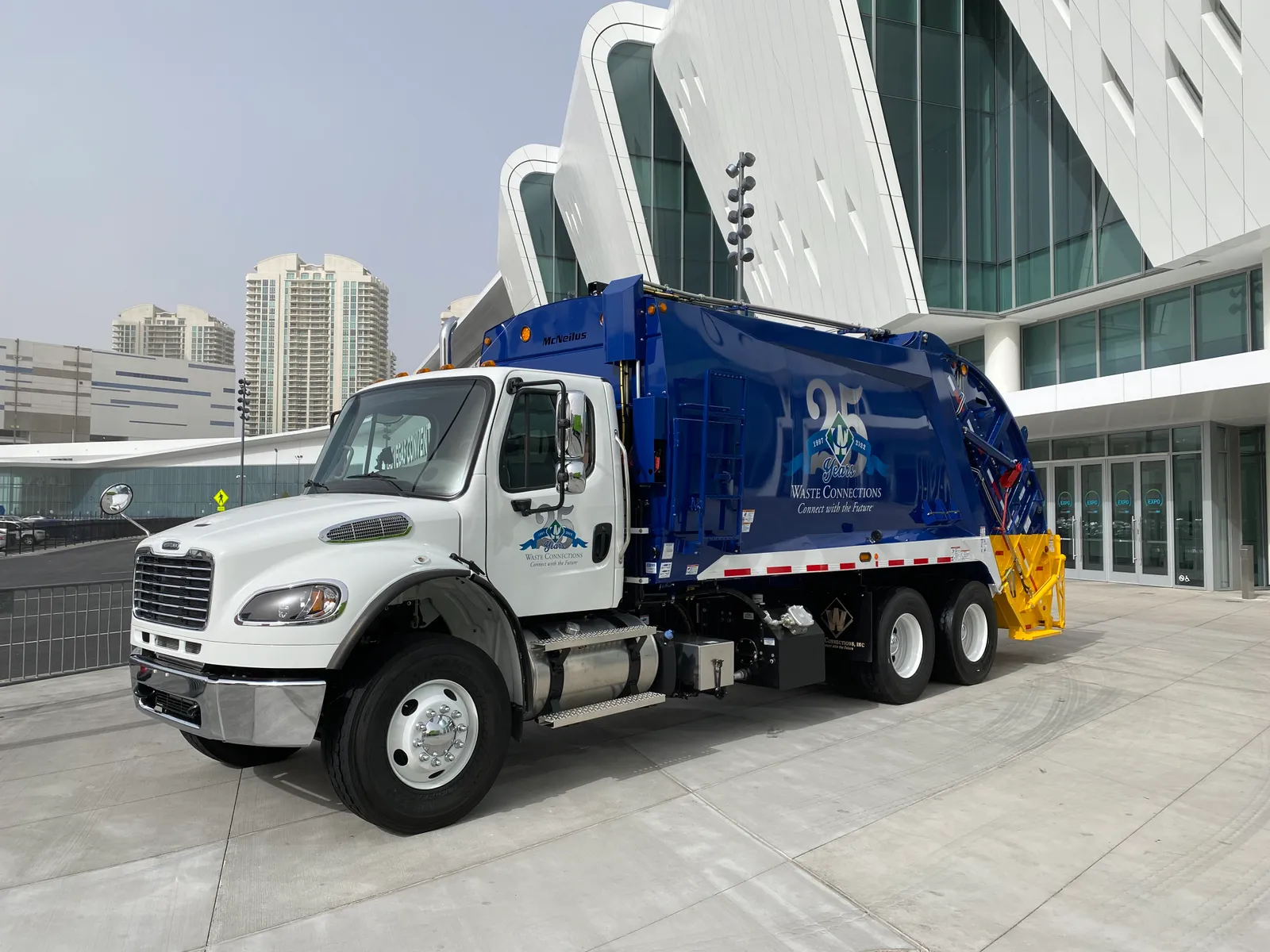 A Waste Connections collection truck is parked in front of the Las Vegas Convention Center