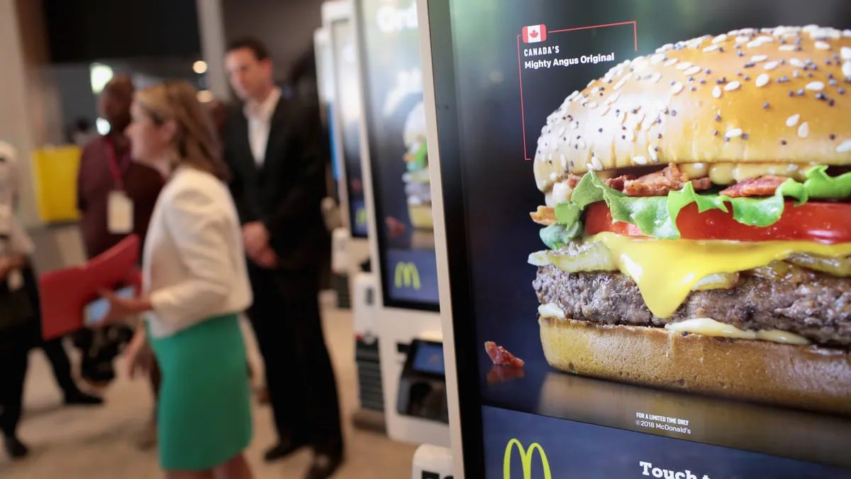 Kiosks for ordering food sit in the dining area of a McDonald's restaurant located inside the company's new corporate headquarters on June 4, 2018 in Chicago, Illinois.