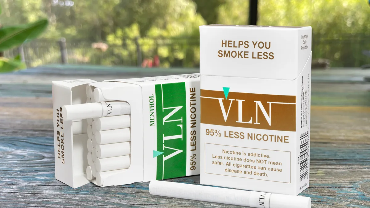 A photo of VLN reduced-tobacco cigarettes on a table.