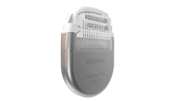 A rounded, metallic device says "Medtronic Percept PC"