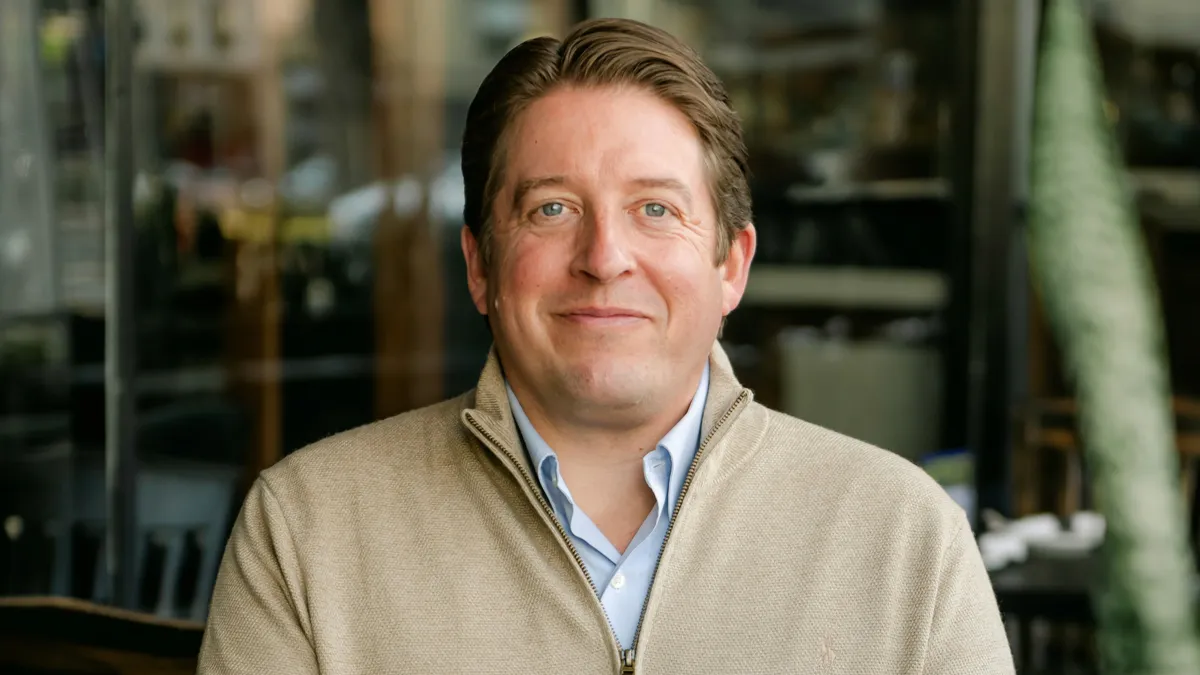 A photograph of John Williams, CEO at True Food Kitchen.