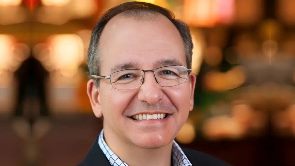 An image of a Beto Guajardo, who is wearing a suit and tie.