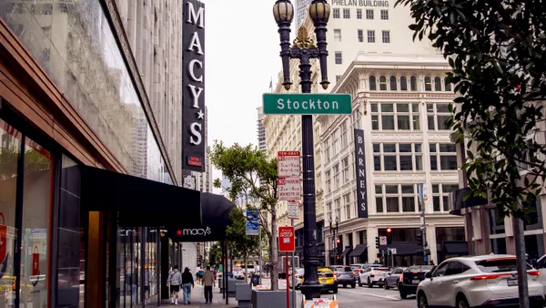 People walking down a city street.