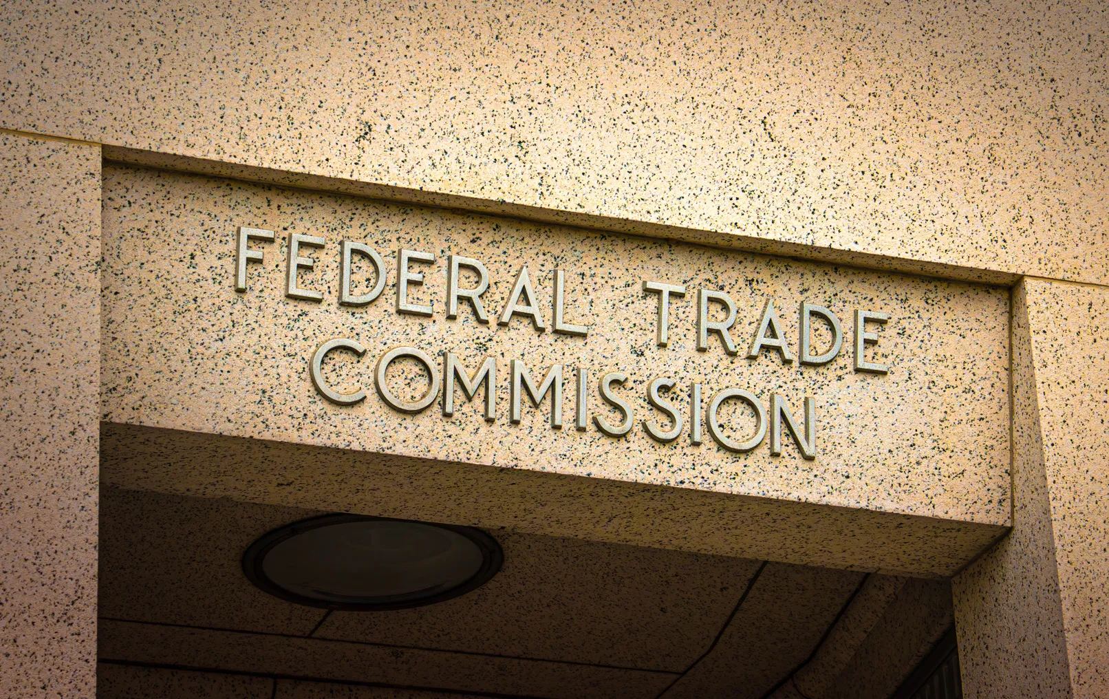 Sign on doorway for the Federal Trade Commission in Washington, D.C.