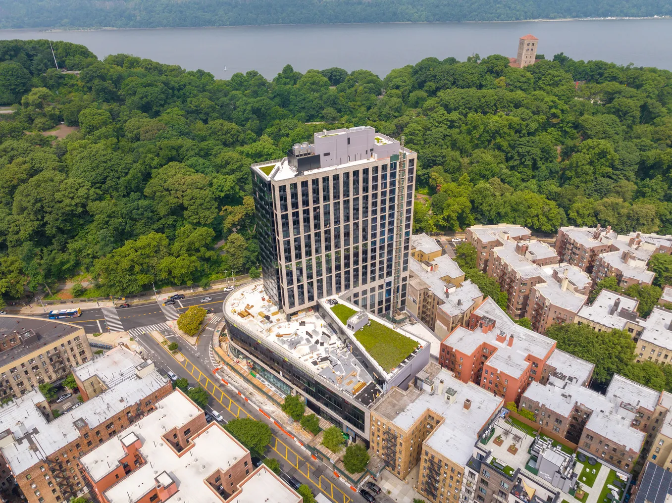 An aerial view of a building with construction nearly finished.