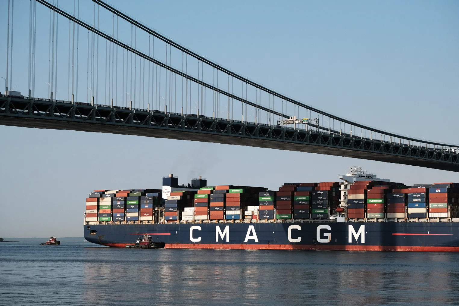 The Marco Polo, the largest cargo ship to call at an East Coast port, arrives under the Verrazzano-Narrows Bridge and into New York Harbor on May 20, 2021