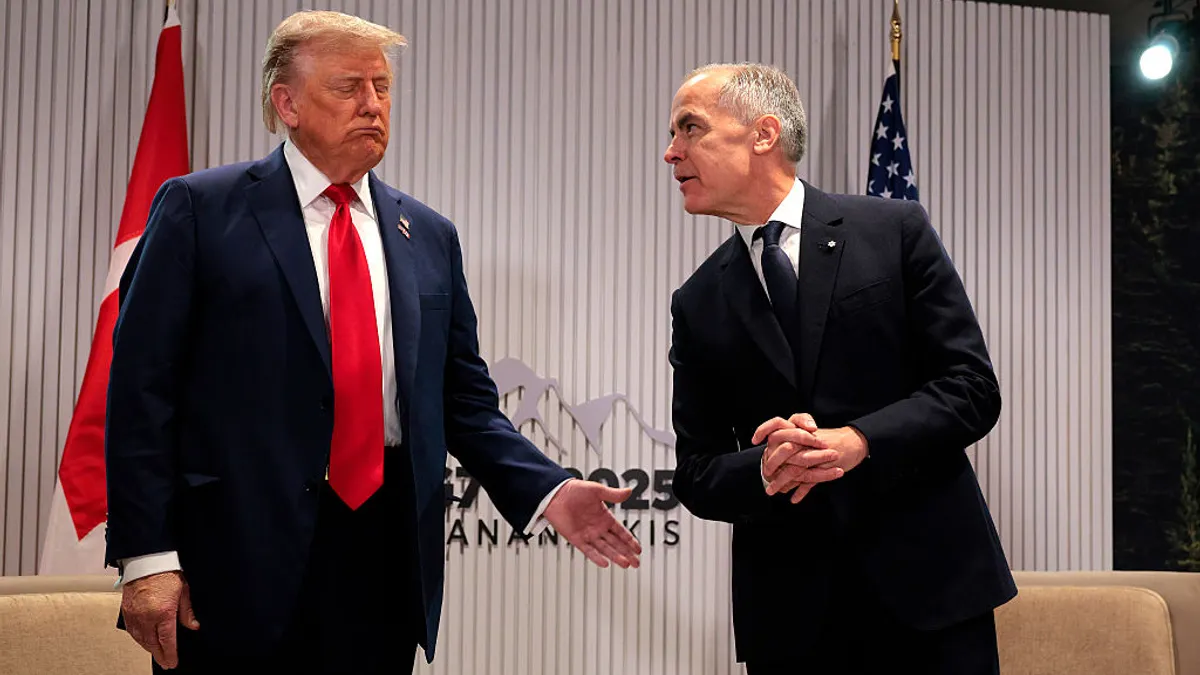 President Donald Trump, Canada Prime Minister Mark Carney standing