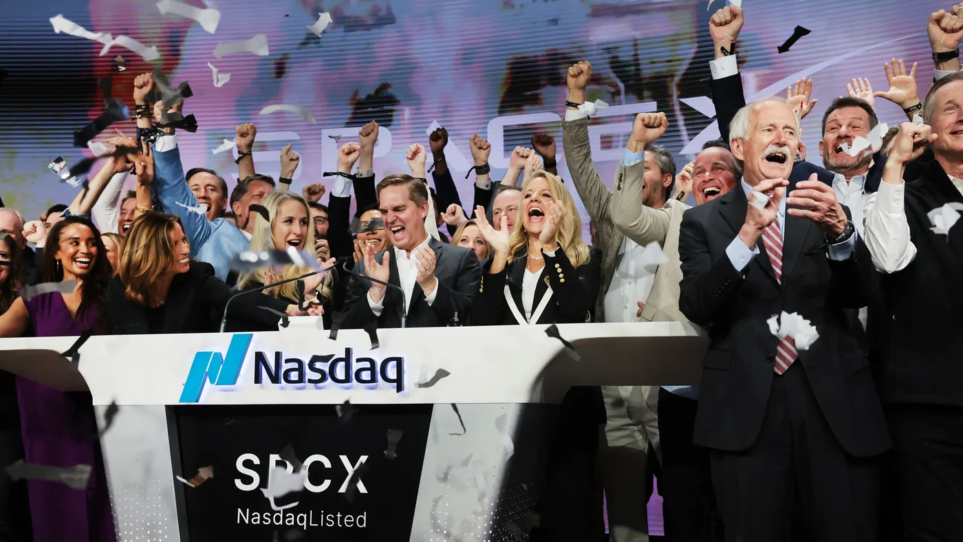 SpaceX employees celebrate during its IPO on June 12 2026