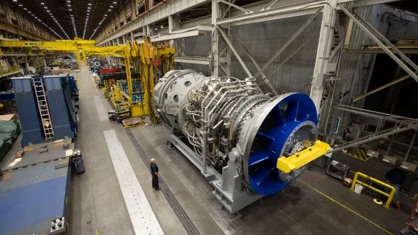 A power plant turbine sits in a manufacturing plant.