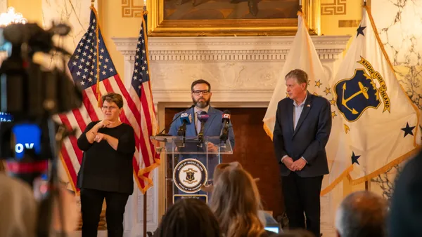 Rhode Island Chief Digital Officer Brian Tardiff and Gov. Dan McKee speak at a Dec. 30 press briefing on the cyberattack against the RIBridges social services database. The officials held a Jan. 10 briefing to notify thousands of recipients that breach notification letters were being mailed out.