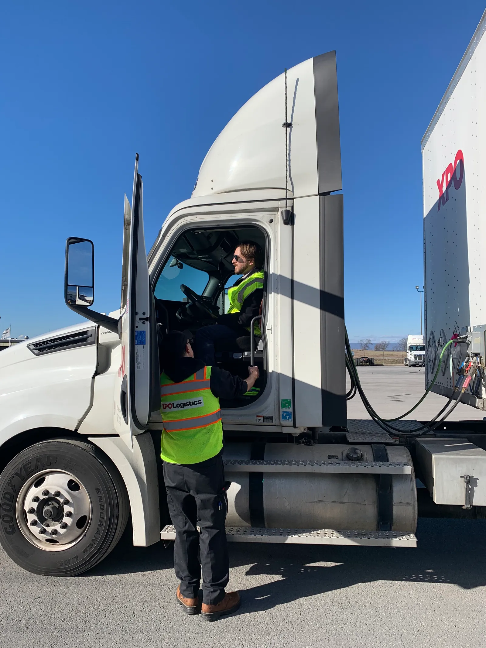 XPO Driver Instructor Don Giffin briefs Transport Dive reporter Colin Campbell before coaching him through driving the truck around the Hagerstown terminal parking lot.