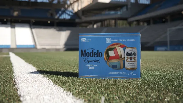 A case of Modelo in a soccer stadium