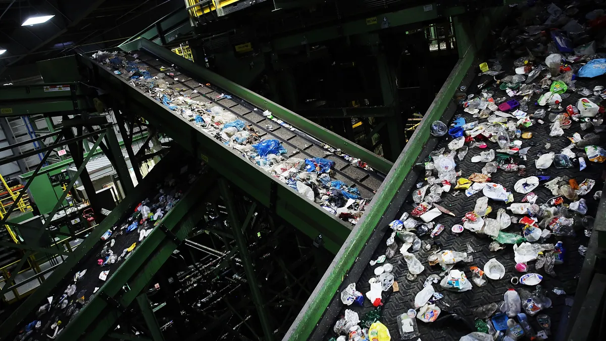 plastic goes down a conveyor belt at a MRF