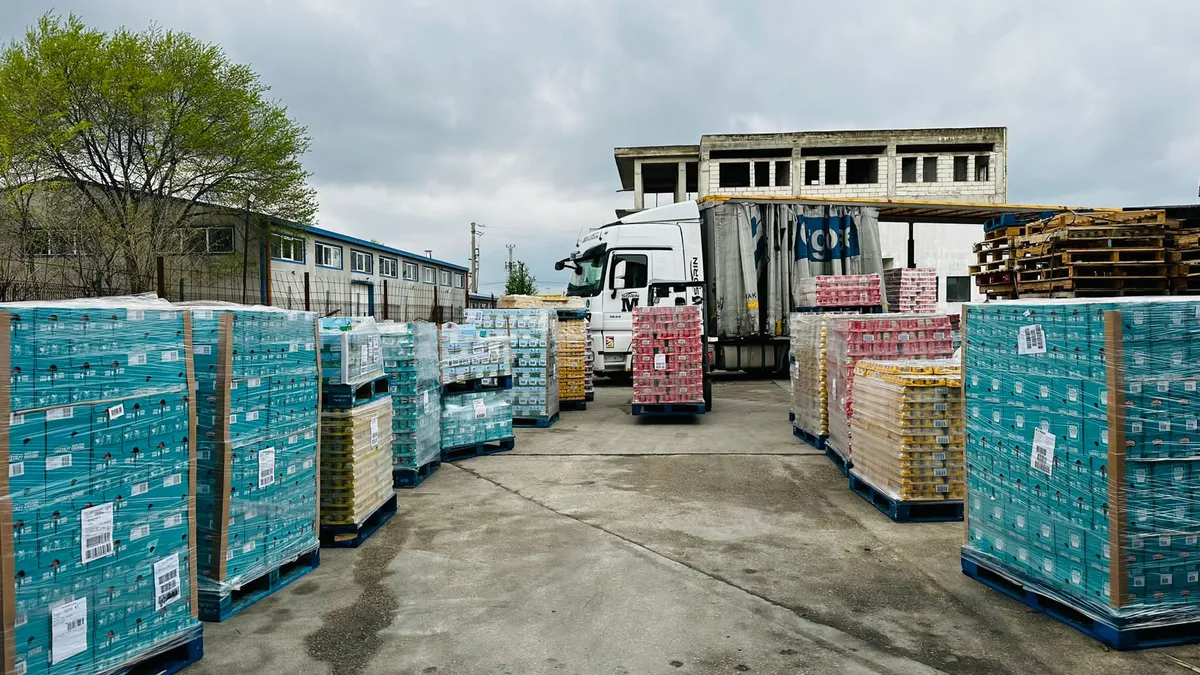 Pallets stacked with Kraft Heinz products.