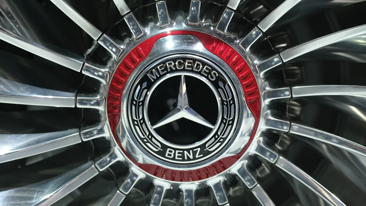 The Mercedes-Benz logo is seen on the wheel hub