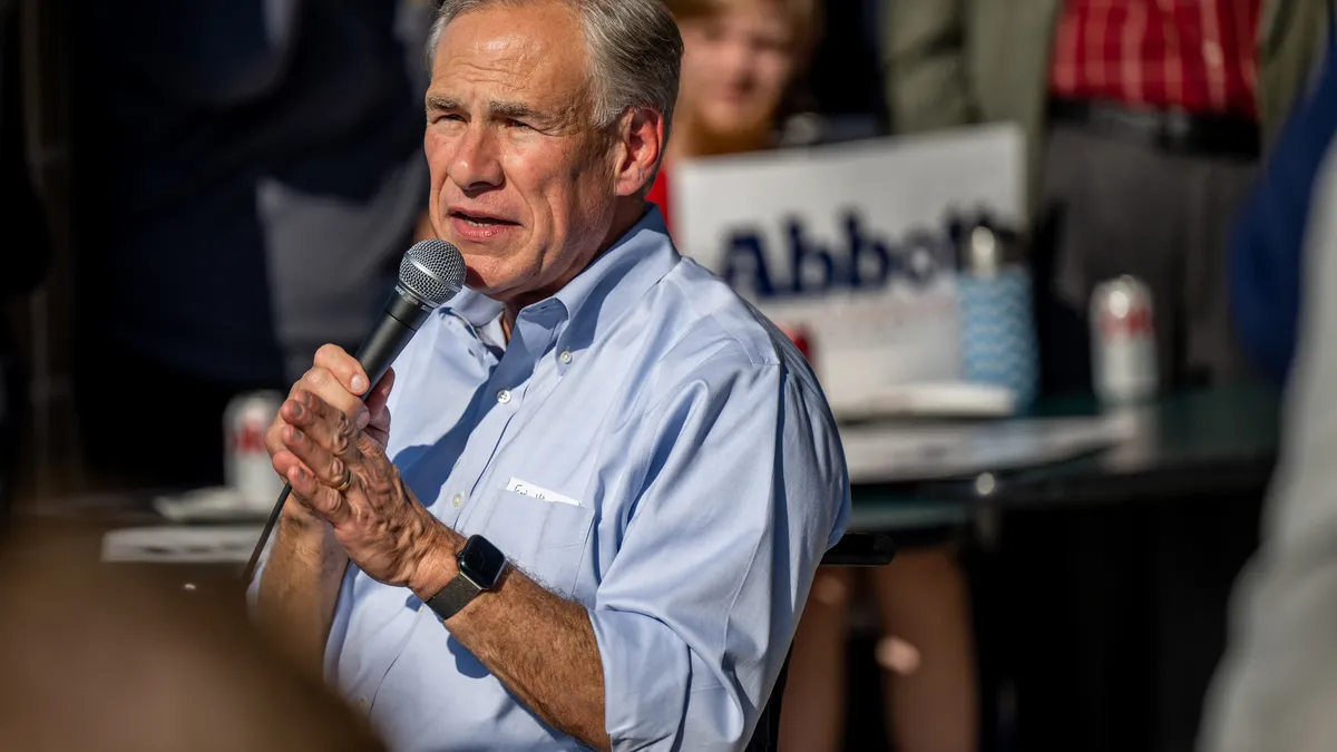 Texas Governor Greg Abbott campaigns for re-election outside Houston