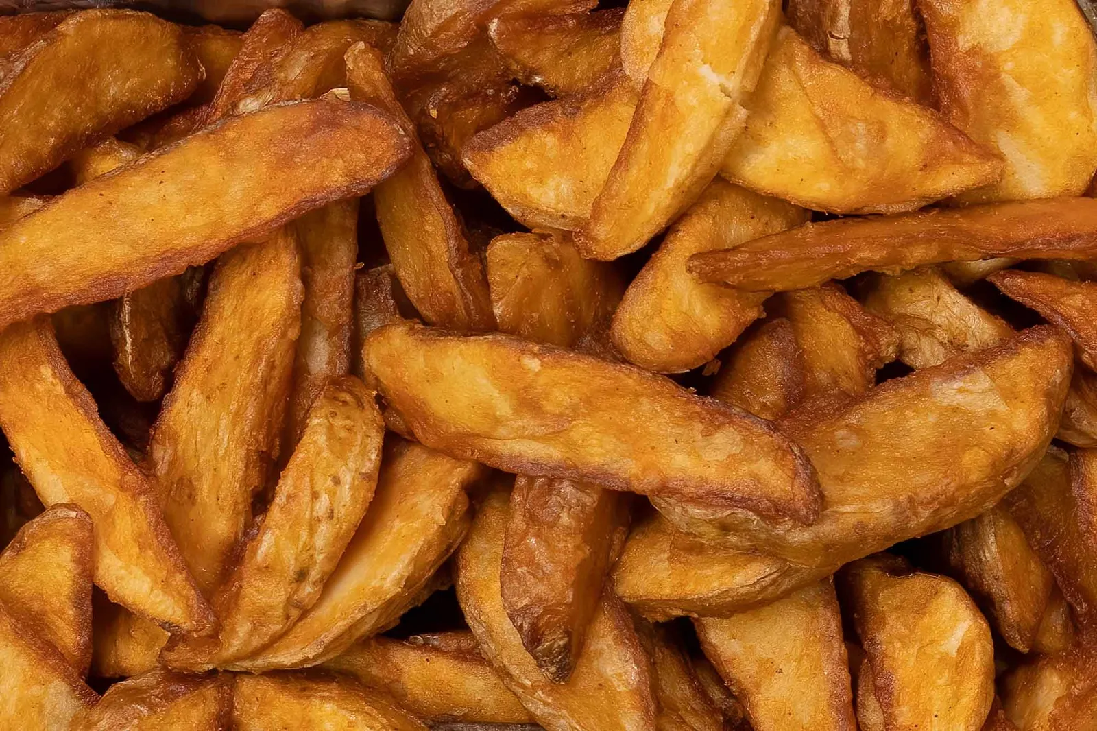 A photo of fried potatoes.