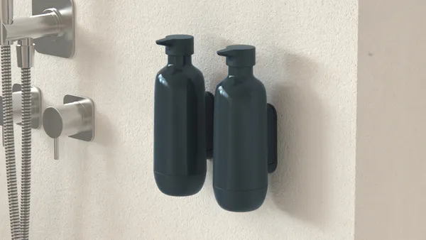 A pair of Meadow's wall-mounted dispensers