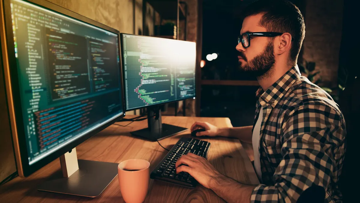 man working on computer