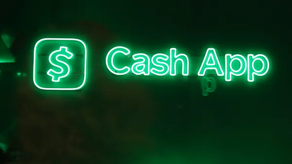 Cash App logo lit in neon