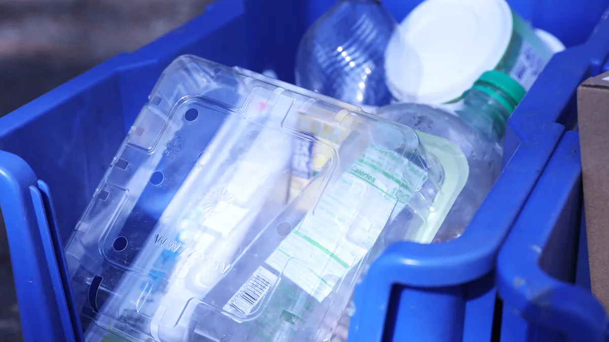 Plastic packaging in recycling bin