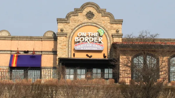 An image of a restaurant with a logo that says "on the border mexican grill & cantina."