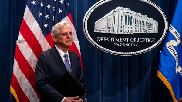 Visa debit card litigation Merrick Garland DOJ